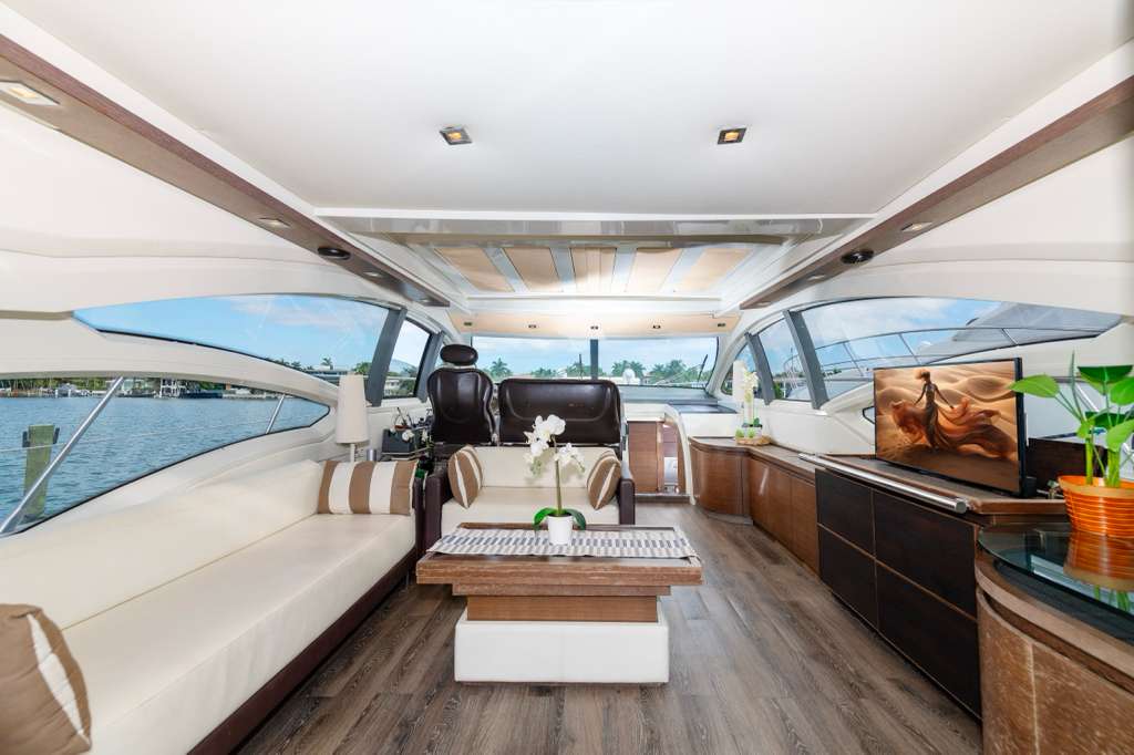 Main salon with panoramic windows aboard Samba Soul